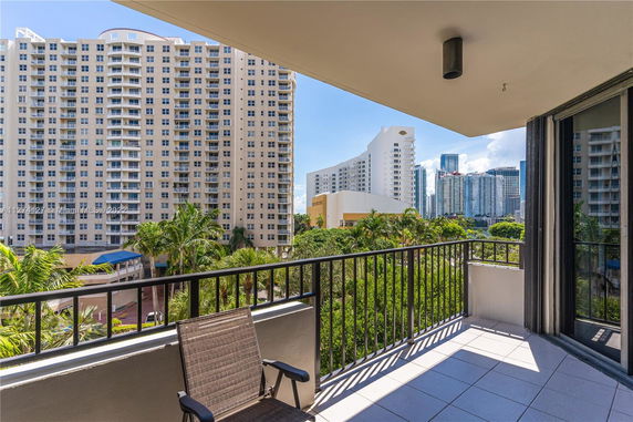View of high-rise buildings from a balcony.