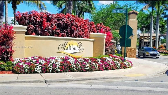 Entrance sign of a residential community named Malibu Bay.