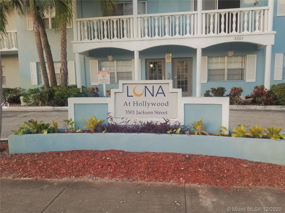 Front view of a building with balconies and a sign for 'Lona at Hollywood' on 3501 Jackson Street.