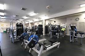 Interior view of a gym with exercise equipment.
