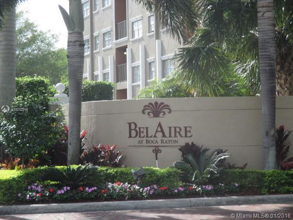 Front view of a residential building with a sign reading 'Bel Aire at Boca Raton'.