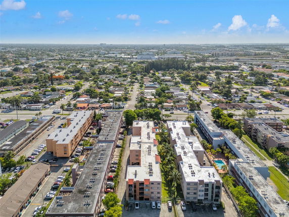 Aerial panoramic view of a residential area with multiple multi-story apartment buildings.