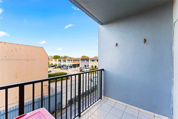 View of surrounding residential buildings from a balcony.