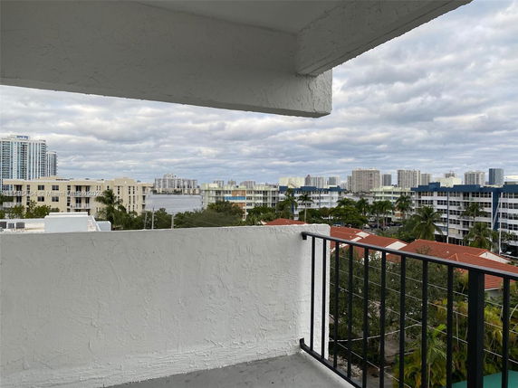 View of surrounding buildings from a balcony.