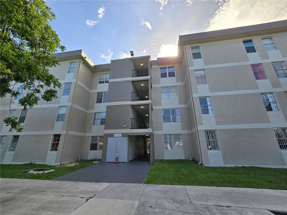 Front view of a multi-story apartment building.