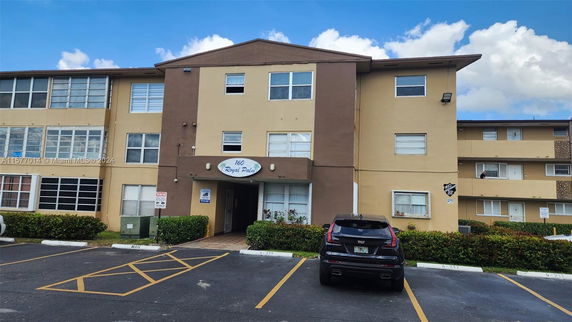 Front view of a multi-story residential building.