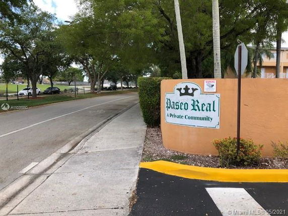 Entrance sign of Paseo Real, a private community.