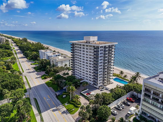 High-rise building near the beach with oceanfront view.
