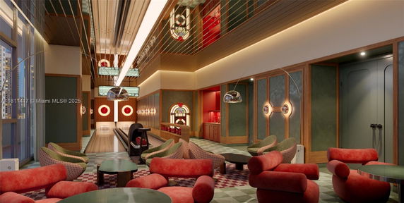 Interior view of a modern recreational room with stylish seating and a bowling alley.