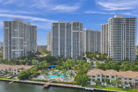 Front view of several high-rise residential buildings.