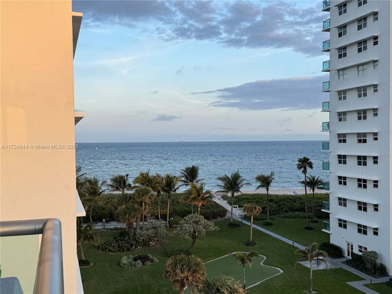 View of the ocean and nearby buildings from a higher vantage point.