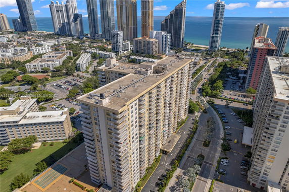 Aerial view of high-rise buildings near the coastline.