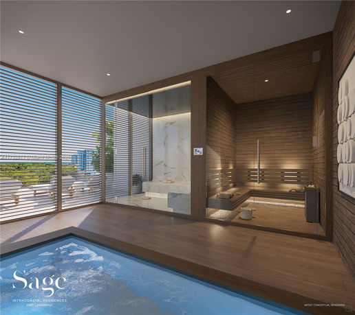 Indoor area with a small pool and a wooden sauna room with lounge seating.