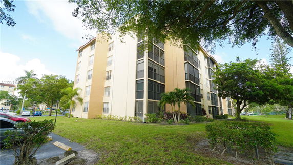 Front view of a multi-story apartment building.