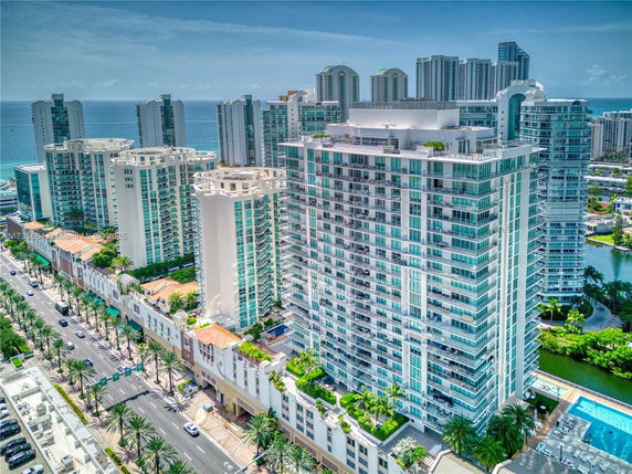 Front view of high-rise residential buildings near the ocean.