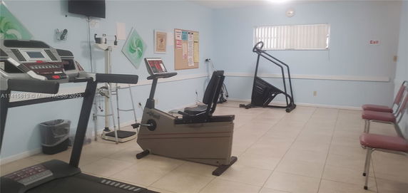 Indoor gym area with exercise equipment