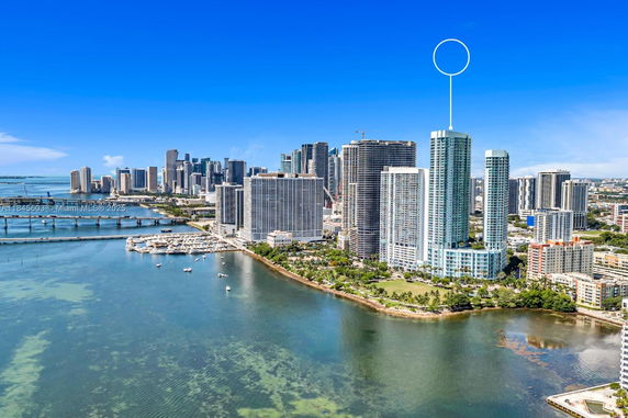 Panoramic view of high-rise buildings by the waterfront in a city.