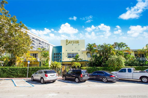 Front view of a building with a sign that reads 'Bayside'.