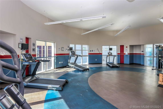 Interior view of a gym area with treadmills and exercise equipment.