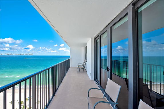 View from a balcony overlooking the ocean.