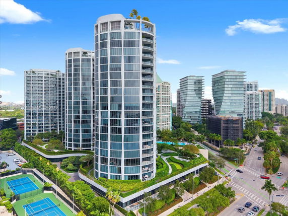 Front view of a high-rise residential complex with multiple towers.