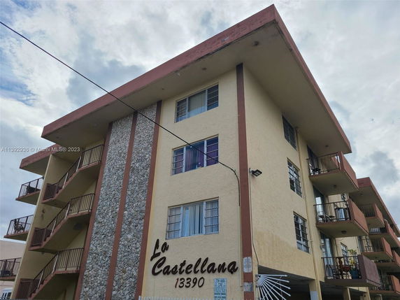 Front view of a multi-story residential building named 'La Castellana'.
