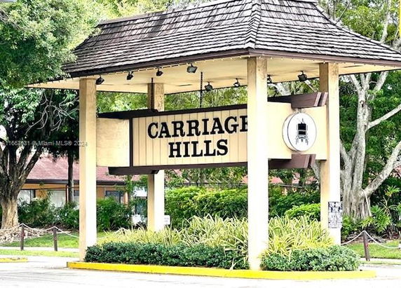 Entrance sign for Carriage Hills community structure.