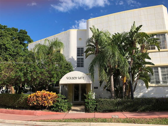 Front view of a two-story building with an entrance canopy labeled 'Golden Gate'.