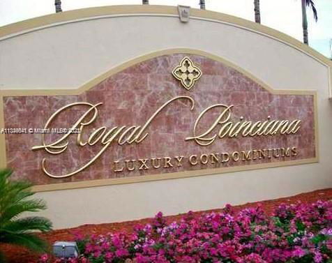 Entrance sign for Royal Poinciana Luxury Condominiums.