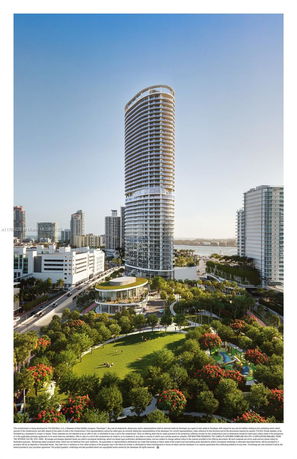 Front view of a tall, modern high-rise building with curved design.