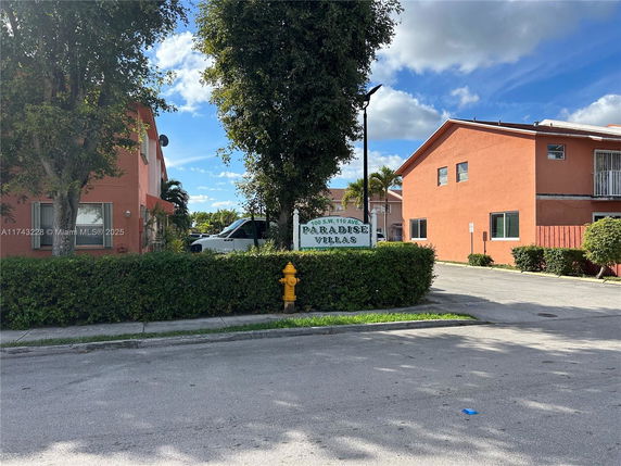 Front view of a two-story residential building complex.