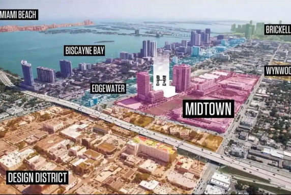 Panoramic aerial view of various districts and Biscayne Bay.