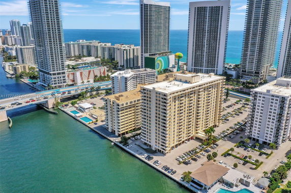 High-rise buildings near a waterway and coastline.