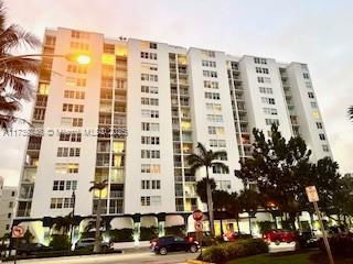 Front view of a multi-story residential building.