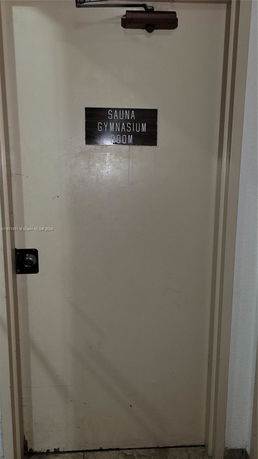 Door labeled 'Sauna Gymnasium Room'.