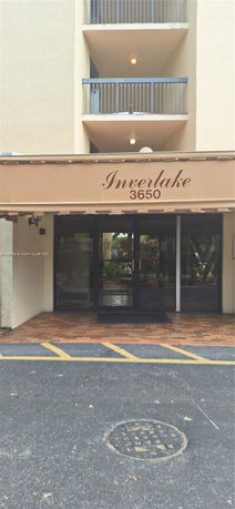 Front view of a building entrance with the name 'Inverlake 3650' displayed above.