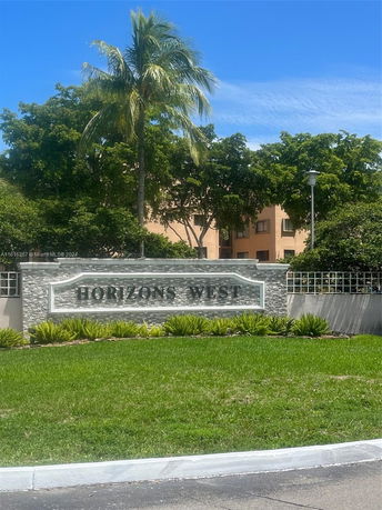 Front view of a building with a sign reading 'Horizons West'.