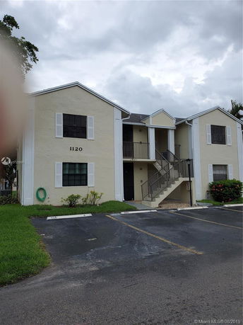 Front view of a two-story residential building.