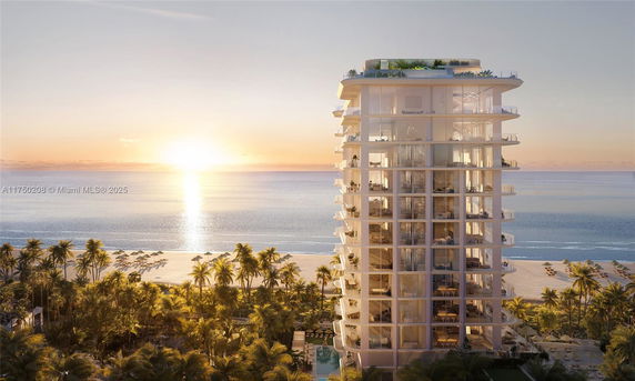 Front view of a high-rise beachfront apartment building at sunset.