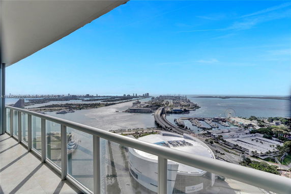 Panoramic view of a waterfront cityscape from a high vantage point