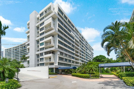 Front view of a multi-story modern apartment building.