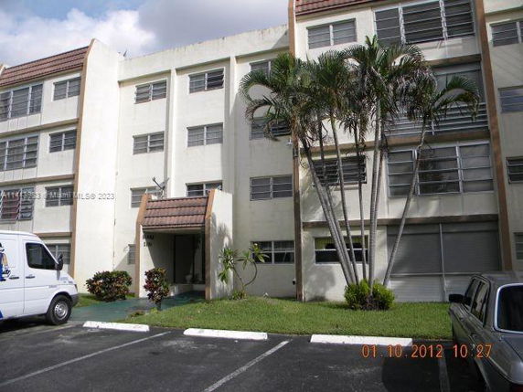 Front view of a multi-story residential building.