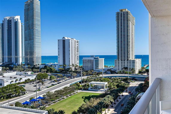 View of tall buildings facing the ocean.