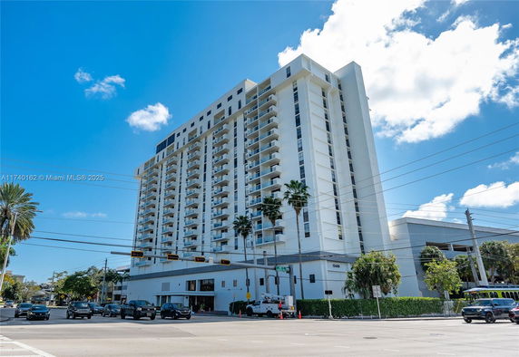 Front view of a multi-story apartment building.