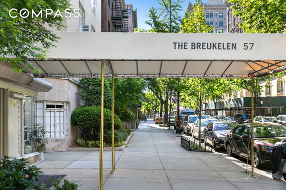 Front view of a building with an entrance canopy labeled 'The Breukelen 57'.