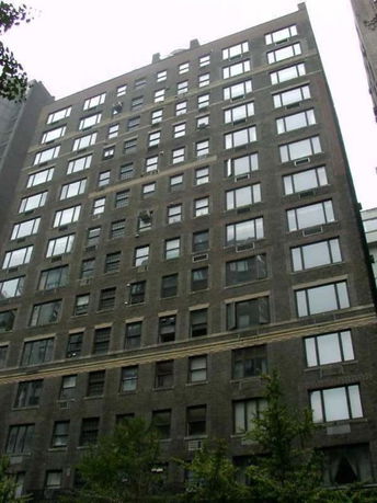 Front view of a multi-story brick building.