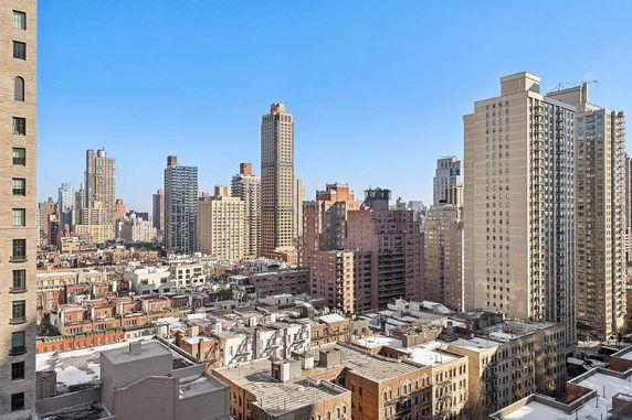 View of surrounding high-rise buildings in a cityscape.