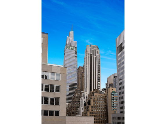 View of multiple high-rise buildings in a cityscape.
