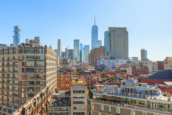 Panoramic view of a cityscape with multiple high-rise buildings.