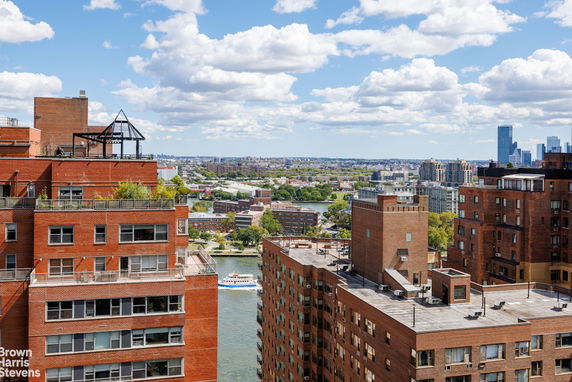 Panoramic view of buildings and surrounding urban landscape.